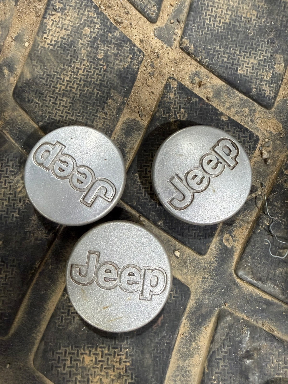 OEM Used Set of 3 1997-2006 Jeep Cherokee Wrangler Silver Center Caps 5DY07TRMAB